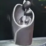 Pealkiri: Armastajate viirukipõleti - romantilise embuse backflow alus