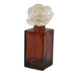 Väike lootose difuuserilill solapuidust nööril